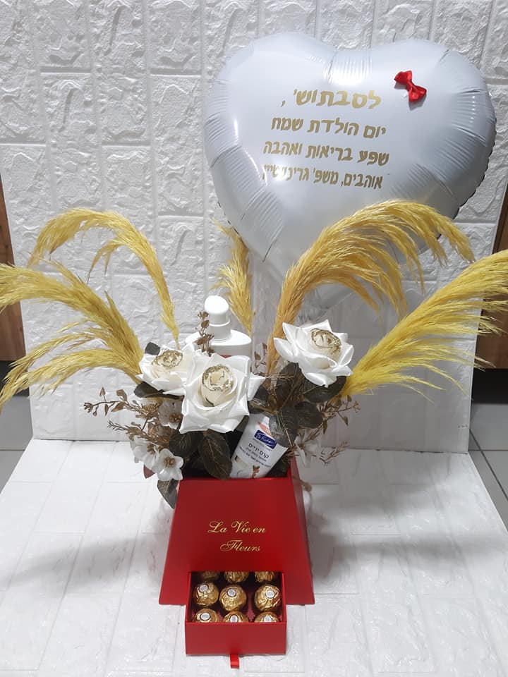 מארז פרחים לאישה